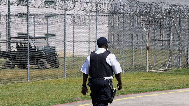 Prison staff work at Lee Correctional Institution, in Bishopville, S.C.. April 10, 2019. Top...