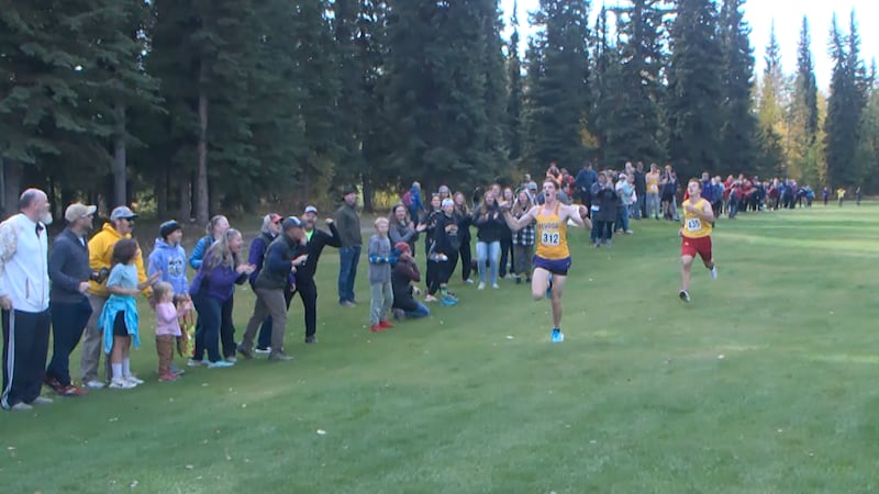 Tucker Sarkasian passing Cirdan Vonnahme right before the finish in the Regional Championship