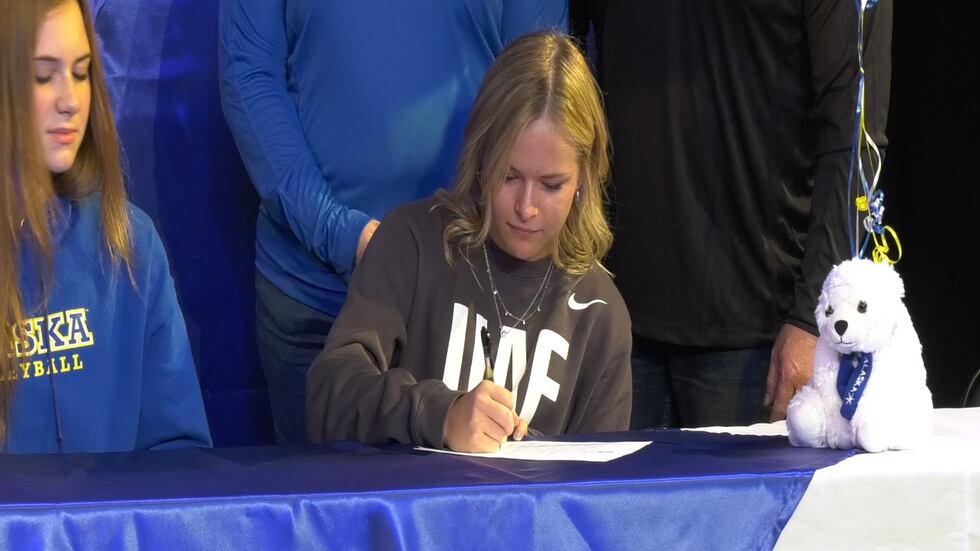 Kinley Erickson signs her national letter of intent to the Alaska Nanooks.