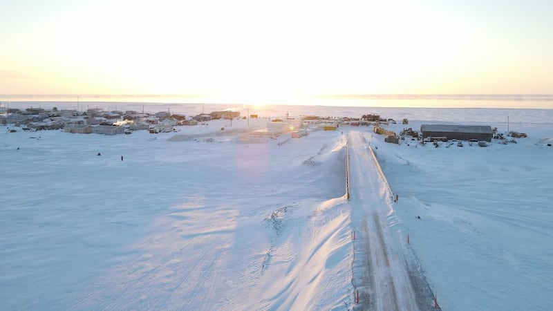 A photo of the sun on the horzion in Kavilana, overlooking the Evac road bridge.