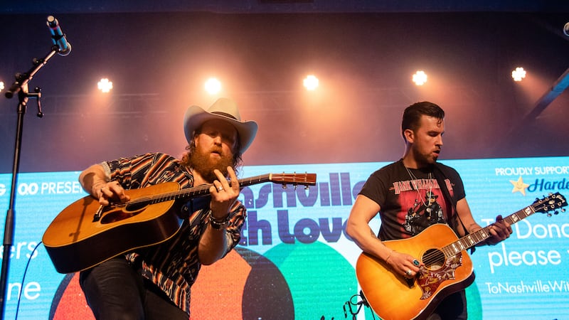John Osborne, left, and TJ Osborne of Brothers Osborne perform at the To Nashville, With Love...
